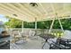 Back deck with seating area perfect for relaxing outdoors and taking in the views at 680 Harbor Point Ct, Lawrenceville, GA 30044