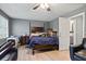 Bedroom with hardwood floors, neutral walls, and an ensuite bathroom at 680 Harbor Point Ct, Lawrenceville, GA 30044