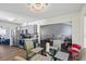 Open kitchen and dining area featuring stainless steel appliances and wood-look flooring at 680 Harbor Point Ct, Lawrenceville, GA 30044