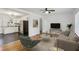 Stylishly furnished living room connected to a modern kitchen with white cabinets at 2130 Main Nw St, Atlanta, GA 30318