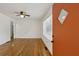 Bright living room features hardwood floors, a ceiling fan, and neutral paint at 2130 Main Nw St, Atlanta, GA 30318