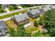 Overhead view showing the property, surrounding yards, and neighborhood streets at 2445 Whitehead Place Dr, Suwanee, GA 30024