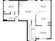 Layout of the first floor includes a living room, kitchen, dining areas, and bedroom at 2445 Whitehead Place Dr, Suwanee, GA 30024