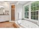 Bathroom features large tub and windows at 434 Westlake Nw Dr, Marietta, GA 30064