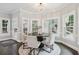 Bright breakfast nook with dark hardwood floors, views of the patio and back yard at 434 Westlake Nw Dr, Marietta, GA 30064