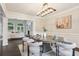 Elegant dining area that opens to a living area with a view to the yard at 434 Westlake Nw Dr, Marietta, GA 30064