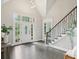 Bright foyer with a staircase and hardwood floors that create an inviting entrance at 434 Westlake Nw Dr, Marietta, GA 30064