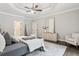 Bedroom features a large bed and ceiling fan at 434 Westlake Nw Dr, Marietta, GA 30064