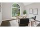Bright office with large arched window, desk and chairs at 434 Westlake Nw Dr, Marietta, GA 30064