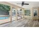Sunroom with large windows overlooking the pool area and natural light at 434 Westlake Nw Dr, Marietta, GA 30064