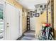 Inviting entryway with tiled floor, white front door, and staircase decorated with Gathering photos at 179 Parkside Dr, Stockbridge, GA 30281