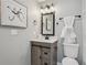 Chic bathroom with modern vanity, framed mirror, and coordinated decor at 524 Paines Nw Ave, Atlanta, GA 30318