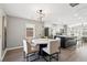 Open floor plan with marble dining table, seamlessly connecting the kitchen and living area at 524 Paines Nw Ave, Atlanta, GA 30318