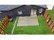 Fenced backyard with a patio and a grassy area, great for outdoor entertaining at 980 Porter Rd, Decatur, GA 30032