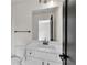 Well-lit bathroom with vanity, sleek fixtures, and modern design at 1128 E Shoreview Rd, Mcdonough, GA 30253