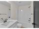 Clean bathroom featuring a tub, shower, and modern fixtures at 1128 E Shoreview Rd, Mcdonough, GA 30253