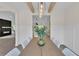 Elegant dining room with stylish lighting, wood beams, and wainscoting, perfect for entertaining and gatherings at 1128 E Shoreview Rd, Mcdonough, GA 30253