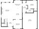 First floor plan showing the layout of the kitchen, living room, and garage, as well as the dining room and foyer at 1128 E Shoreview Rd, Mcdonough, GA 30253
