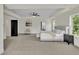 Spacious main bedroom features large windows and a peaceful sitting area at 1128 E Shoreview Rd, Mcdonough, GA 30253