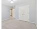 The bedroom offers ample storage with a double closet and easy access to an adjacent bathroom at 3835 Thornhill Sw Dr, Lilburn, GA 30047