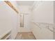 Walk-in closet with carpet flooring and built-in shelving at 3835 Thornhill Sw Dr, Lilburn, GA 30047