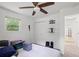 Bedroom featuring a ceiling fan, natural light, and closet or storage space at 4051 Dixie Ln, Douglasville, GA 30135
