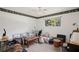 Bedroom with a floral trim, natural light, and ceiling fan at 4051 Dixie Ln, Douglasville, GA 30135
