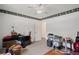 Bedroom with a floral trim, ceiling fan, closet, and lots of natural light at 4051 Dixie Ln, Douglasville, GA 30135