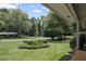 Manicured front yard showing a lush green lawn and mature landscaping at 4051 Dixie Ln, Douglasville, GA 30135