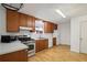 Efficient kitchen featuring wood cabinets and stainless steel appliances at 4051 Dixie Ln, Douglasville, GA 30135