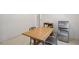Eat in kitchen featuring stainless steel refrigerator and dining table and chairs at 4051 Dixie Ln, Douglasville, GA 30135
