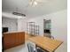 Open kitchen design with view to sitting room with a ceiling fan at 4051 Dixie Ln, Douglasville, GA 30135