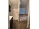 A clean and well-lit bathroom features a shower, tub, and vanity at 5752 Little River Rd, Atlanta, GA 30349