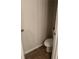 View of the downstairs toilet room with tile floors at 5752 Little River Rd, Atlanta, GA 30349