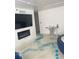 A modern designed bedroom with a fireplace and designer floor at 620 Peachtree #901 Ne St, Atlanta, GA 30308