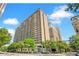 High-rise apartment building with multiple balconies and street view at 620 Peachtree #901 Ne St, Atlanta, GA 30308