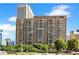 Modern high-rise apartment building featuring private balconies for each unit at 620 Peachtree #901 Ne St, Atlanta, GA 30308