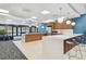 Spacious kitchen and lounge area with countertop seating, stainless steel appliances at 620 Peachtree #901 Ne St, Atlanta, GA 30308