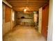 Unfinished basement with exposed beams and concrete floor at 6264 Godfrey Sw Dr, Mableton, GA 30126