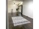 Spacious living room featuring hardwood floors, a large window, and bright, natural light at 6264 Godfrey Sw Dr, Mableton, GA 30126