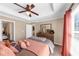 Bedroom with decorative molding, ample natural light, and access to an ensuite bathroom at 805 Pleasant Hill Nw Rd # 343, Lilburn, GA 30047