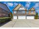 Attractive townhome community featuring individual two car garages at 805 Pleasant Hill Nw Rd # 343, Lilburn, GA 30047