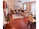 Comfortable living room with a sectional sofa, decorative rug, and plenty of natural light at 805 Pleasant Hill Nw Rd # 343, Lilburn, GA 30047