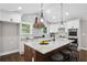 Modern kitchen with stainless steel appliances, granite countertops, and a large island at 942 Mclinden Se Ave, Smyrna, GA 30080