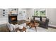 Comfortable living room with built-in shelves, fireplace, and modern decor at 942 Mclinden Se Ave, Smyrna, GA 30080