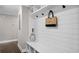 Mudroom features a bench, coat hooks, and storage cubbies, blending style and functionality at 942 Mclinden Se Ave, Smyrna, GA 30080
