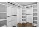 Large walk-in closet with custom shelving and drawers, perfect for organization at 942 Mclinden Se Ave, Smyrna, GA 30080