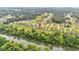 Stunning aerial view of the community homes bordering a scenic river at 101 River Walk Pkwy, Euharlee, GA 30145