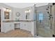 Modern bathroom features double sinks, granite counters, and glass enclosed tiled shower at 101 River Walk Pkwy, Euharlee, GA 30145