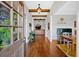 Welcoming foyer with hardwood floors and an open floor plan that leads to the living area at 101 River Walk Pkwy, Euharlee, GA 30145